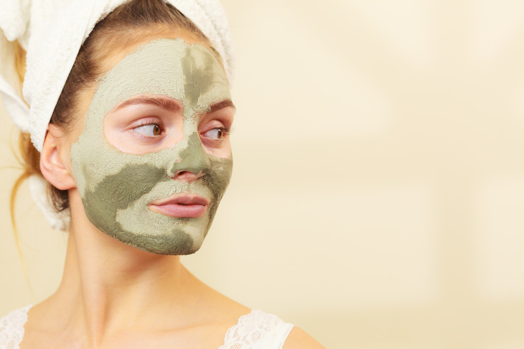 Woman face with green clay mud mask  - Photo, Image