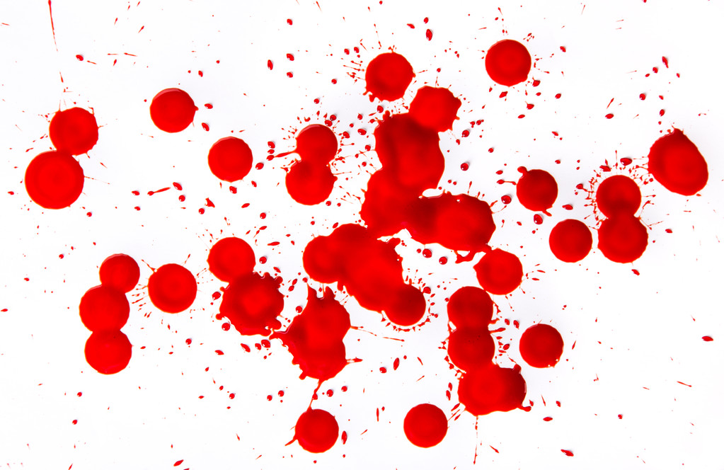 Розплановані плями крові на білому тлі
 - Фото, зображення