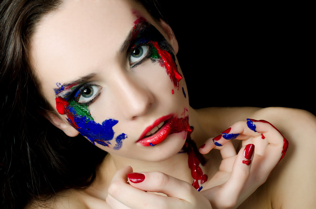 Krásná žena s malování na obličej - Fotografie, Obrázek