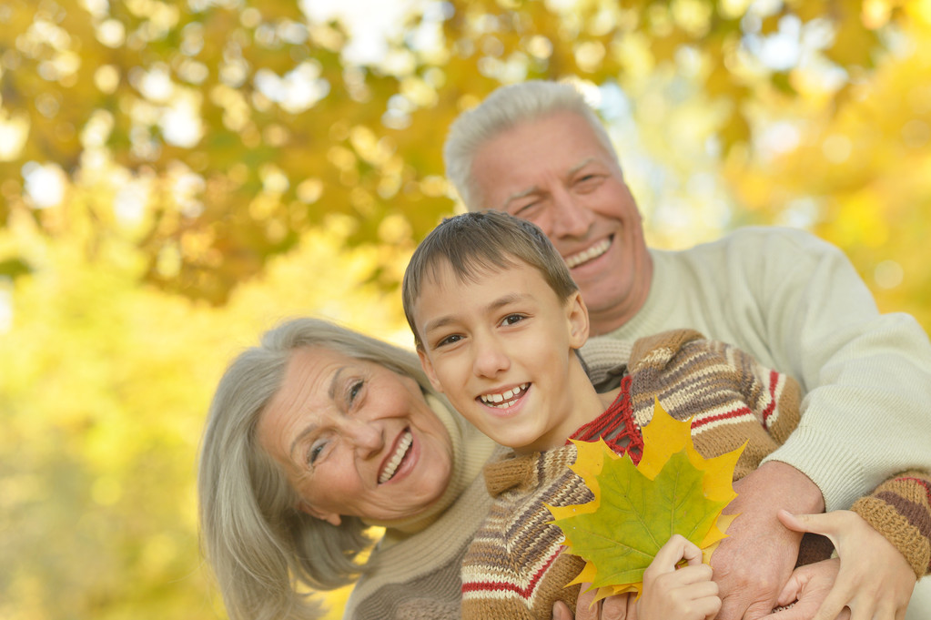 Family in autumn park - Photo, Image