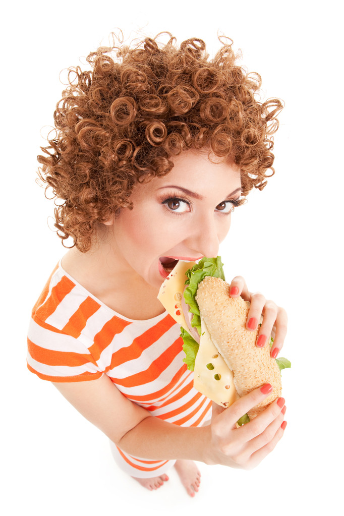 διασκέδαση γυναίκα με σάντουιτς για το λευκό φόντο - Φωτογραφία, εικόνα