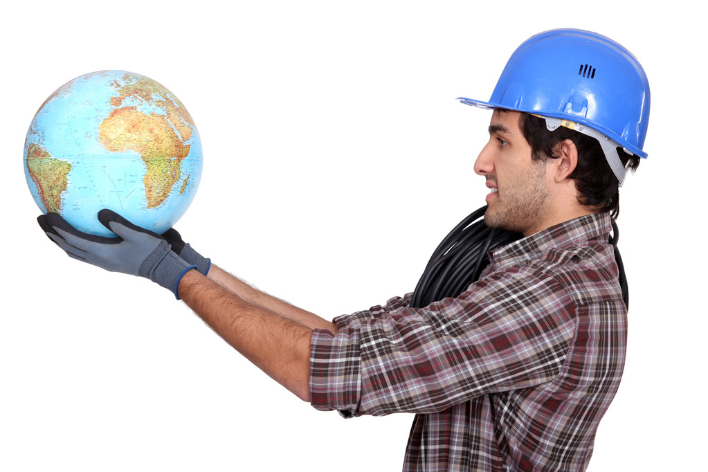 Trabalhador segurando um globo
 - Foto, Imagem