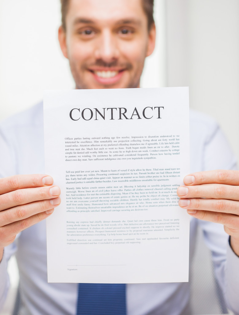 cierre del documento del contrato de tenencia de empresarios
 - Foto, imagen