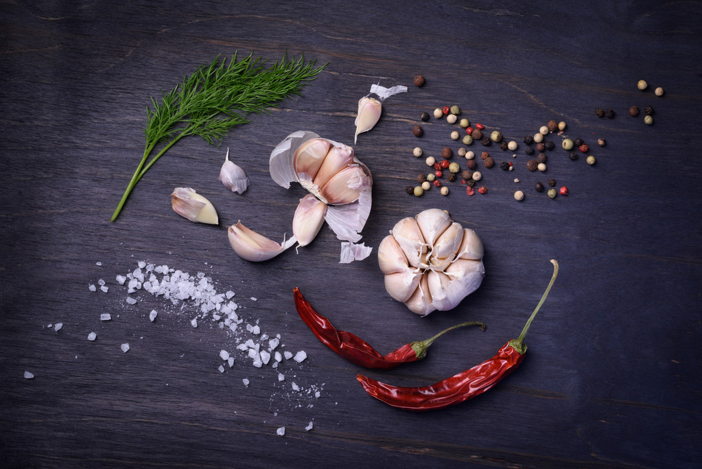 Seasoning ingredients: spices, pepper mix, chili pepper, garlic, dill, salt. Top view on rustic wooden table. - Photo, Image
