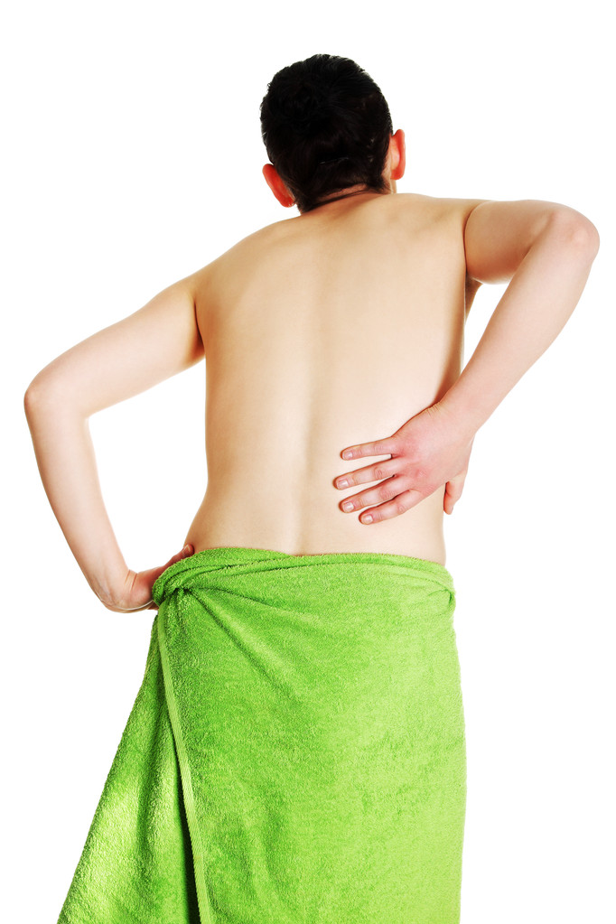 молода жінка з болем у спині
 - Фото, зображення