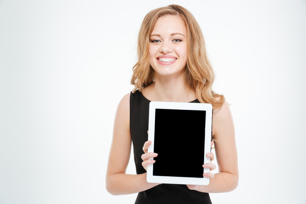 Cheerful charming young business woman holding blank screen tablet  - Photo, Image