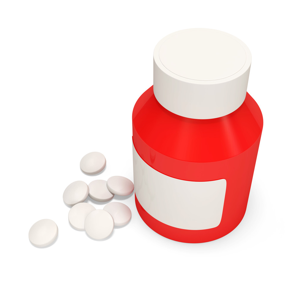 Frasco de pastillas sobre fondo blanco - Foto, imagen
