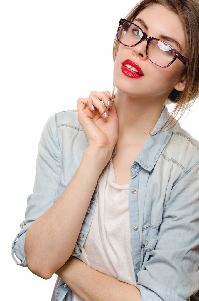 Beautiful young woman with perfect skin in glasses on a white background - Photo, Image