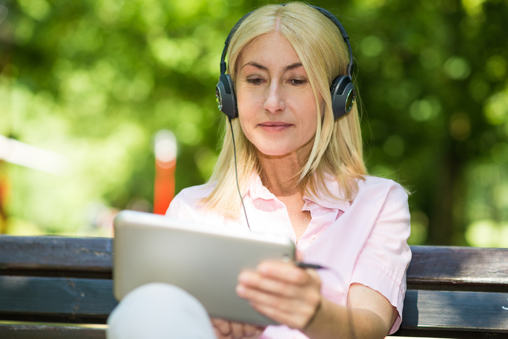 woman listening music outdoors - Photo, Image