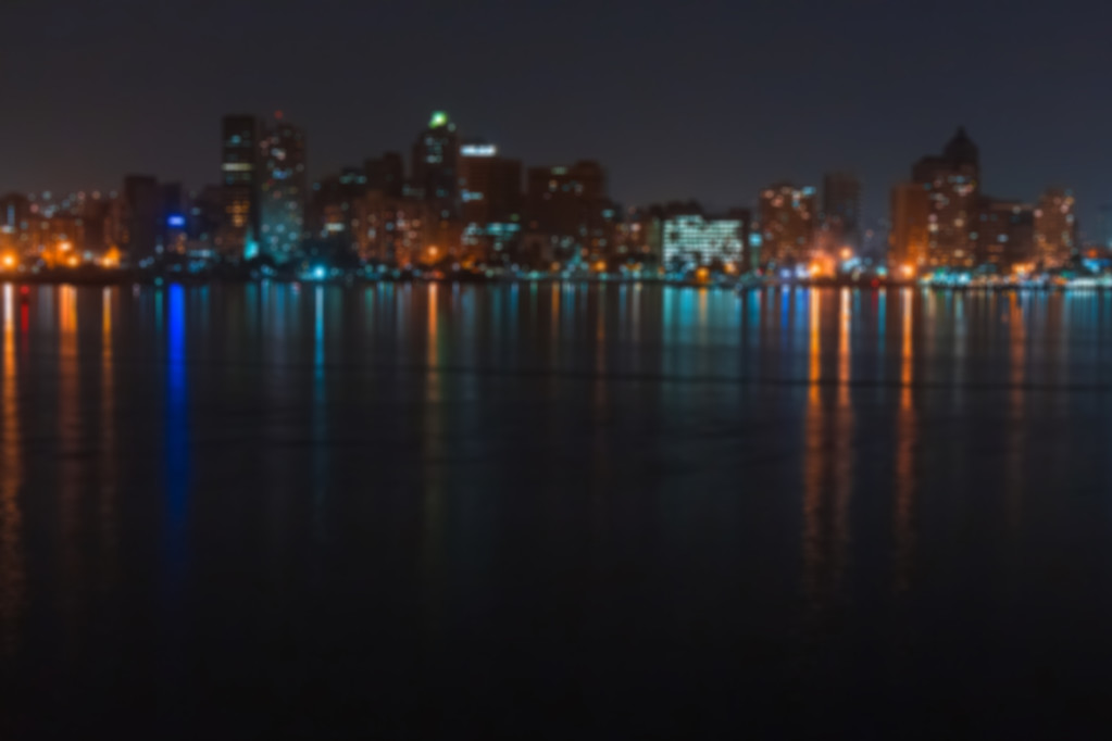 Blurred city and lake landscape at night. - Photo, Image