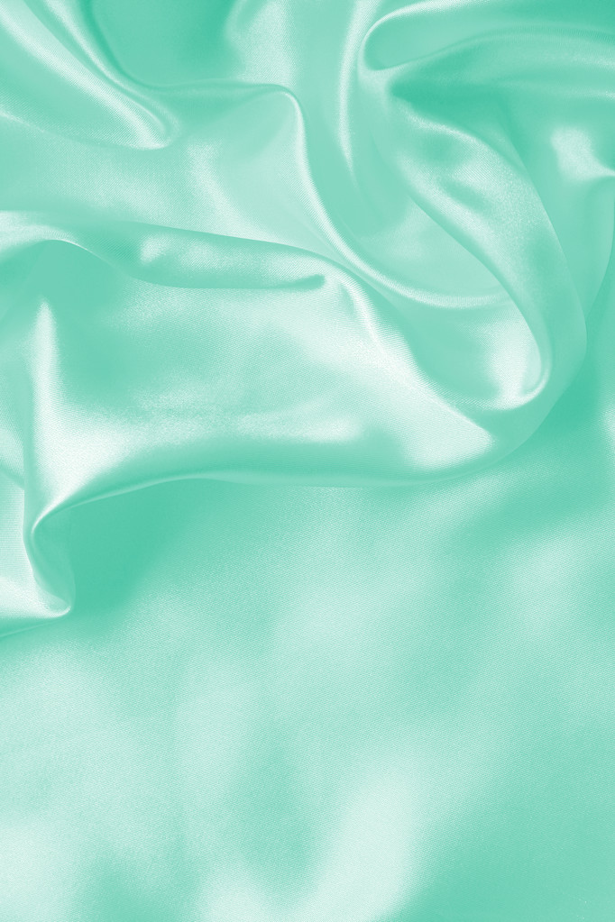 Ομαλή και κομψό πράσινο μετάξι ή σατέν υφή ως φόντο - Φωτογραφία, εικόνα