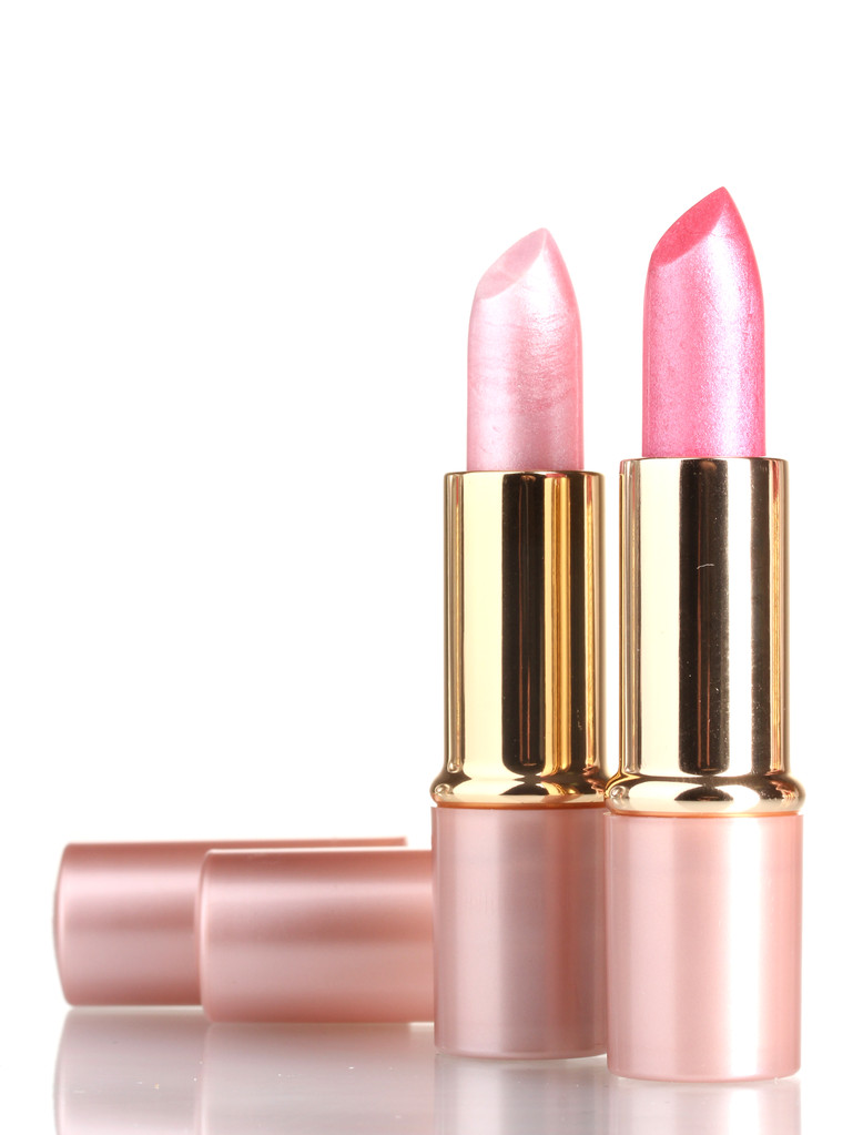 hermosos lápices labiales rosados aislados en blanco
 - Foto, imagen
