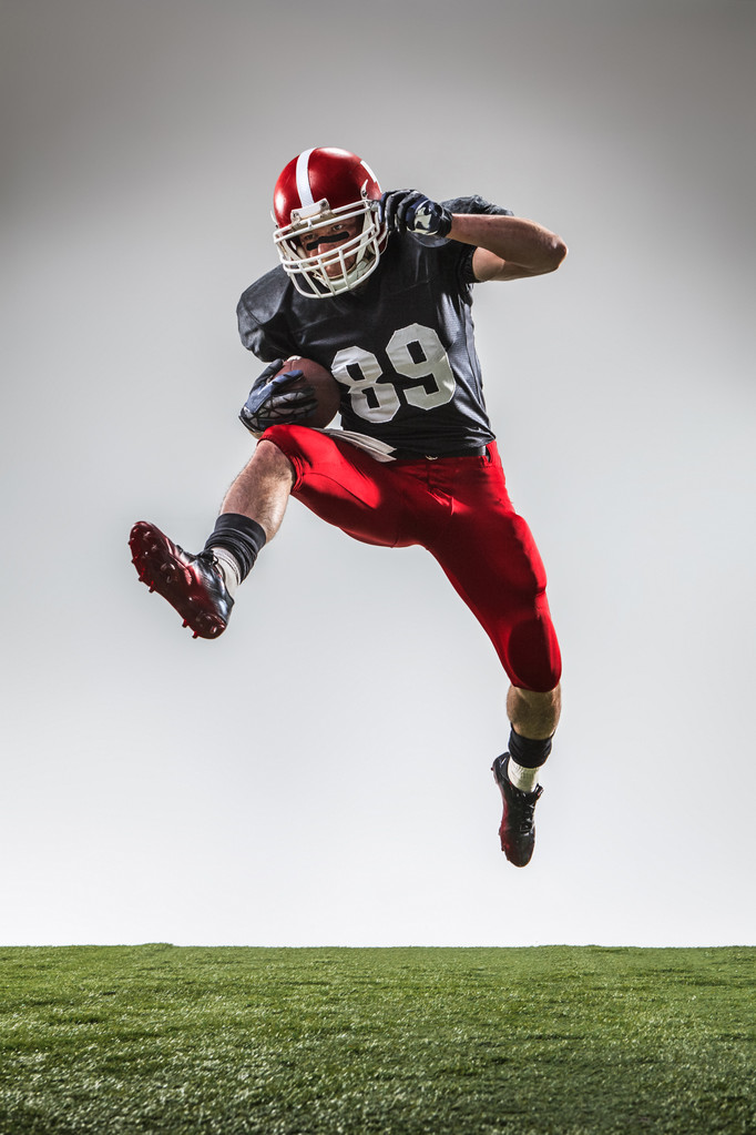 Il giocatore di football americano in azione
 - Foto, immagini