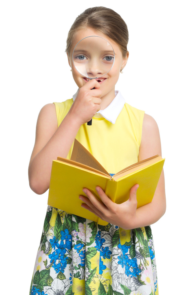 Pieni tyttö kirjojen kanssa - Valokuva, kuva