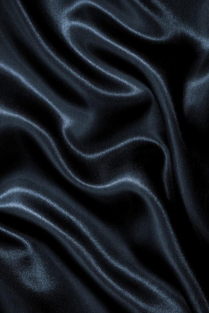 Ομαλή κομψό σκούρο γκρι μετάξι ή σατέν ως φόντο - Φωτογραφία, εικόνα