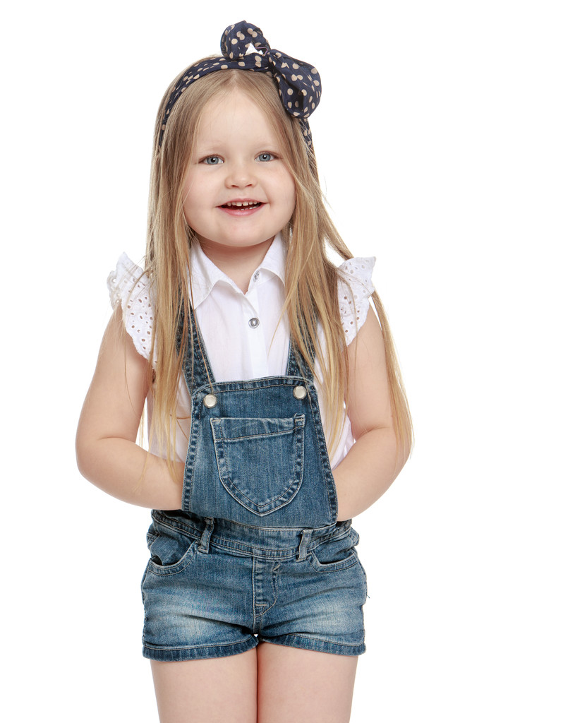 Meisje in denim Amerikaanse overalls - Foto, afbeelding