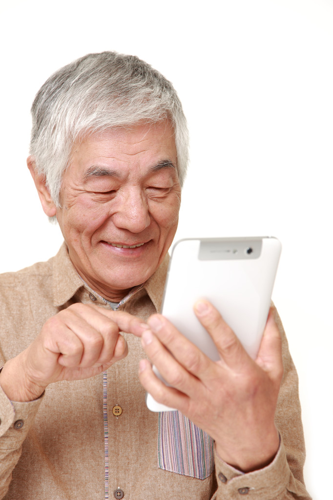 senior Japanese man using tablet computer - Photo, Image