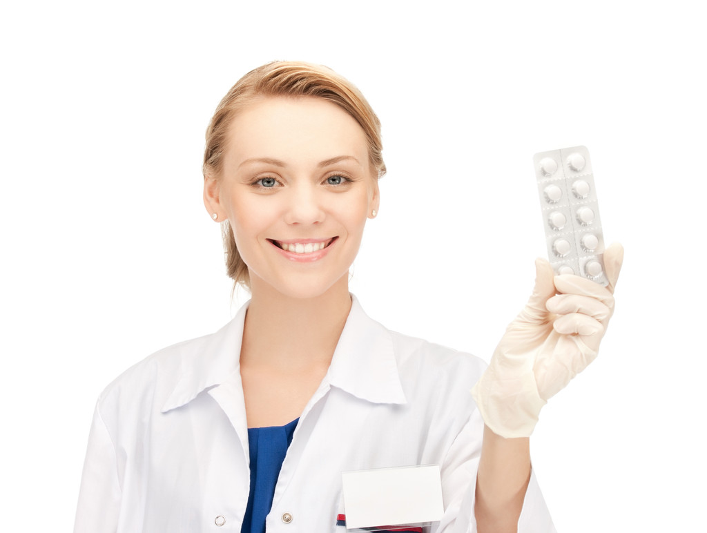Attrayant médecin féminin avec des pilules
 - Photo, image