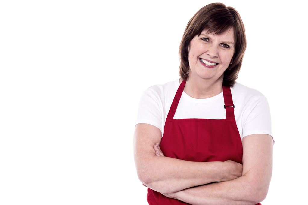 Chefe de cozinha mulher sênior em avental vermelho
 - Foto, Imagem