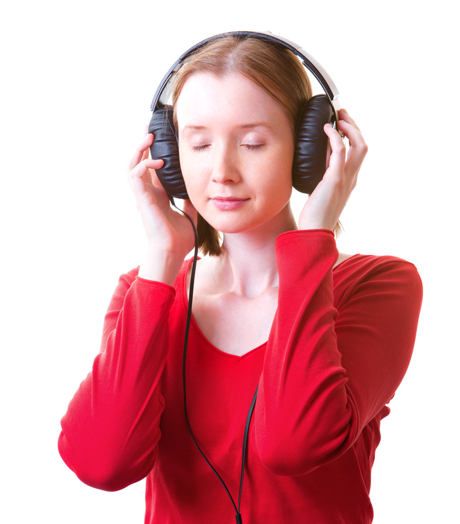 Jovem mulher em fones de ouvido
 - Foto, Imagem