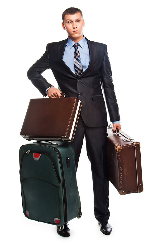 Jeune homme d'affaires avec trois valises
 - Photo, image
