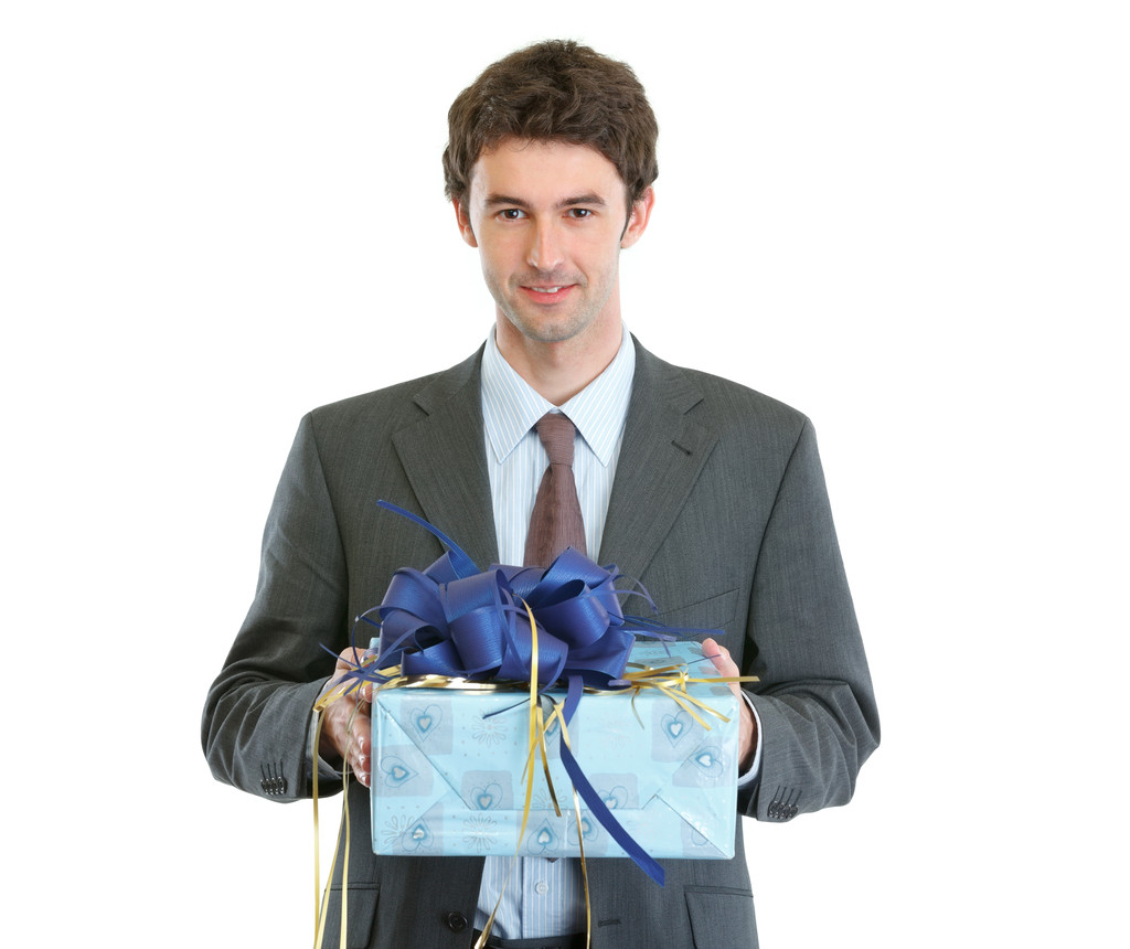 Modern businessman with present in hands - Photo, Image
