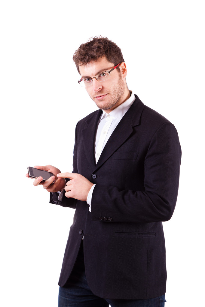 młody biznesmen z smartphone na biały - Zdjęcie, obraz