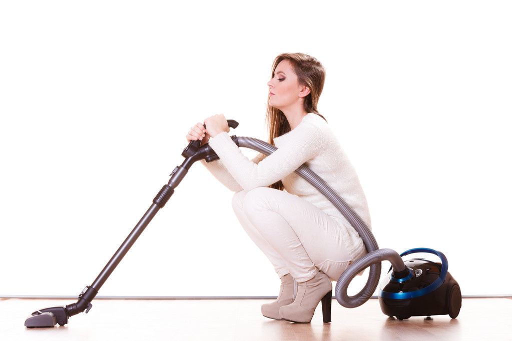 Funny girl with vacuum cleaner. Housework - Photo, Image