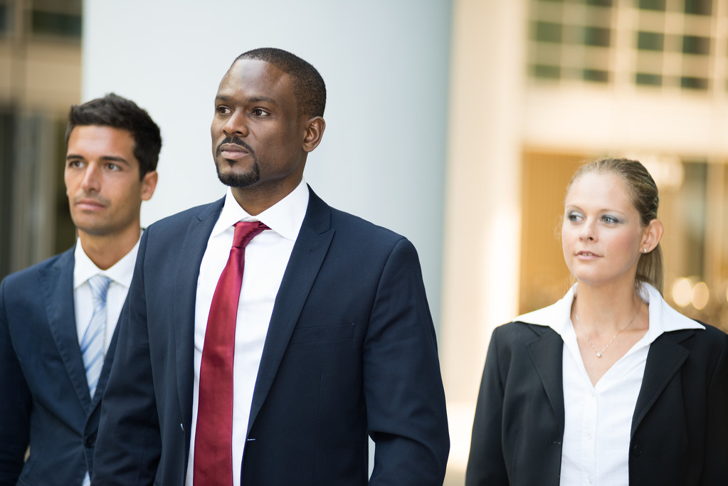 african businessman in front of his team - Photo, Image