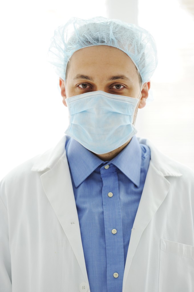 Arzt mit Maske im Krankenhaus - Foto, Bild