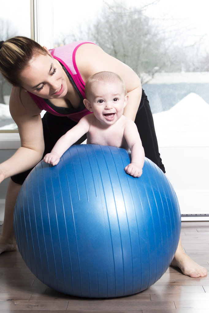 Mother with child boy doing fitness exercises - Photo, Image