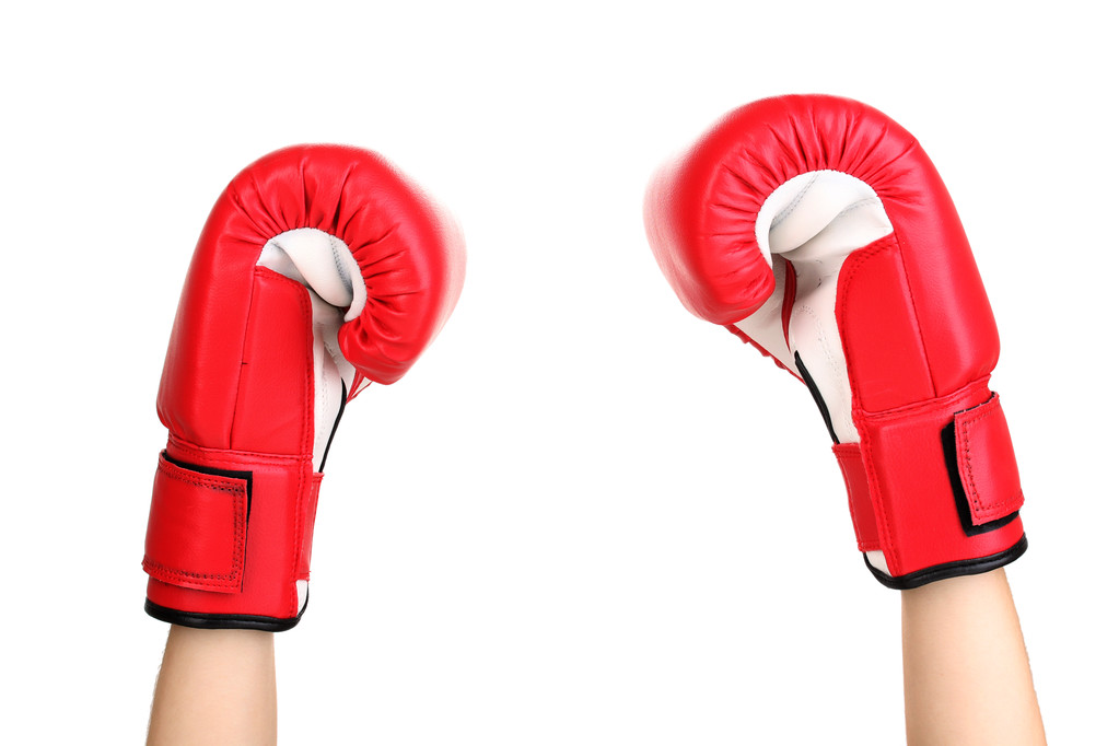 Red boxing gloves on hands isolated on white - Photo, Image