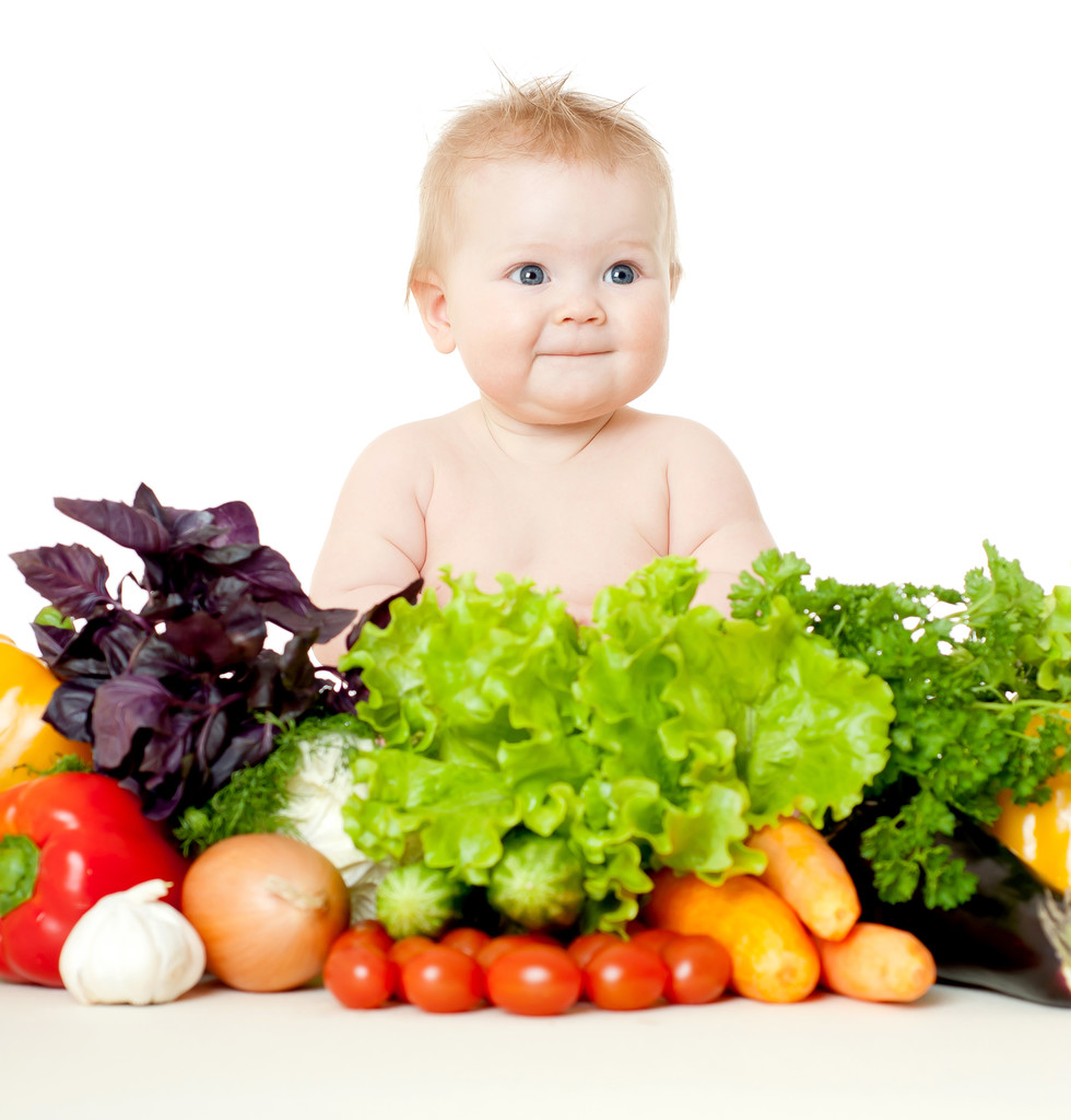 funny baby with vegetables - Photo, Image