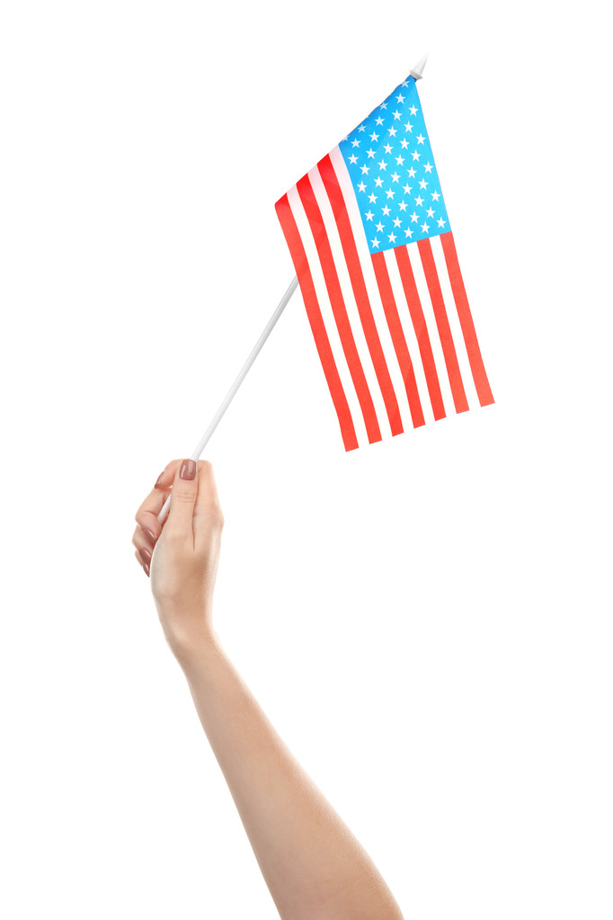 Ręka gospodarstwa amerykańską flagę  - Zdjęcie, obraz