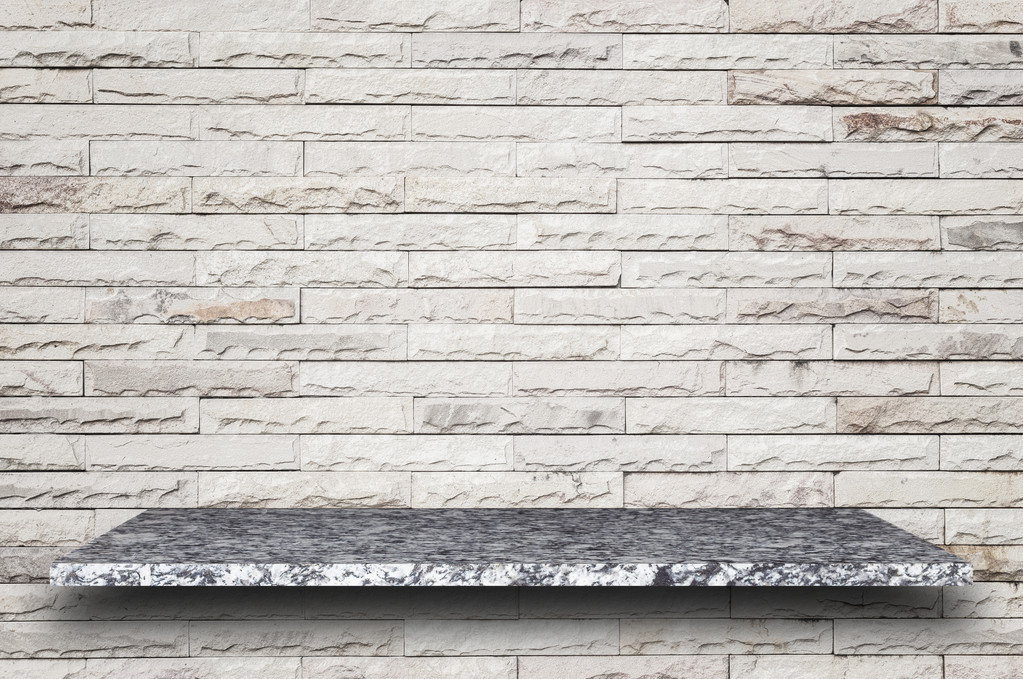 Empty top of natural stone shelves and stone wall background - Photo, Image