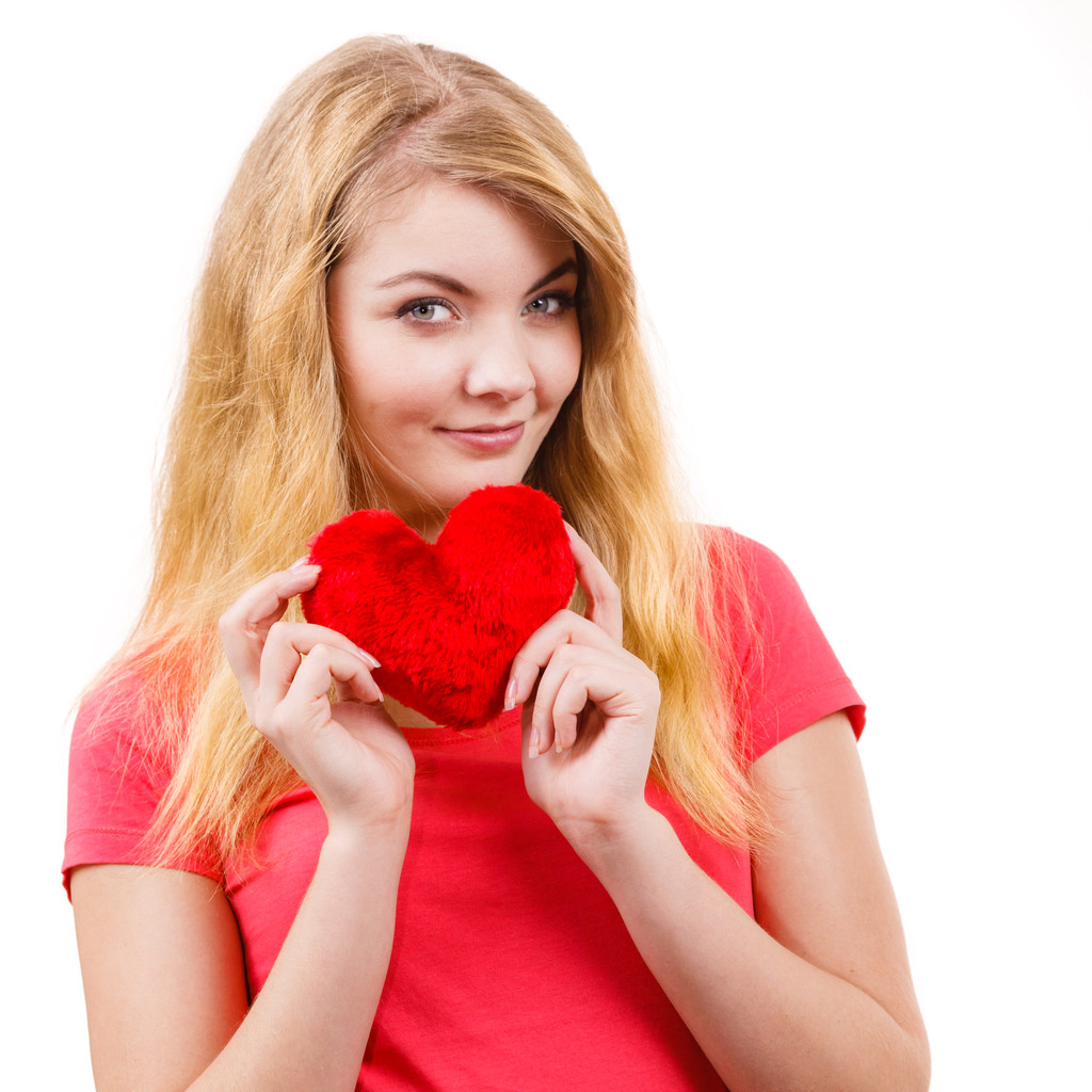Woman blonde girl holding red heart love symbol  - Photo, Image
