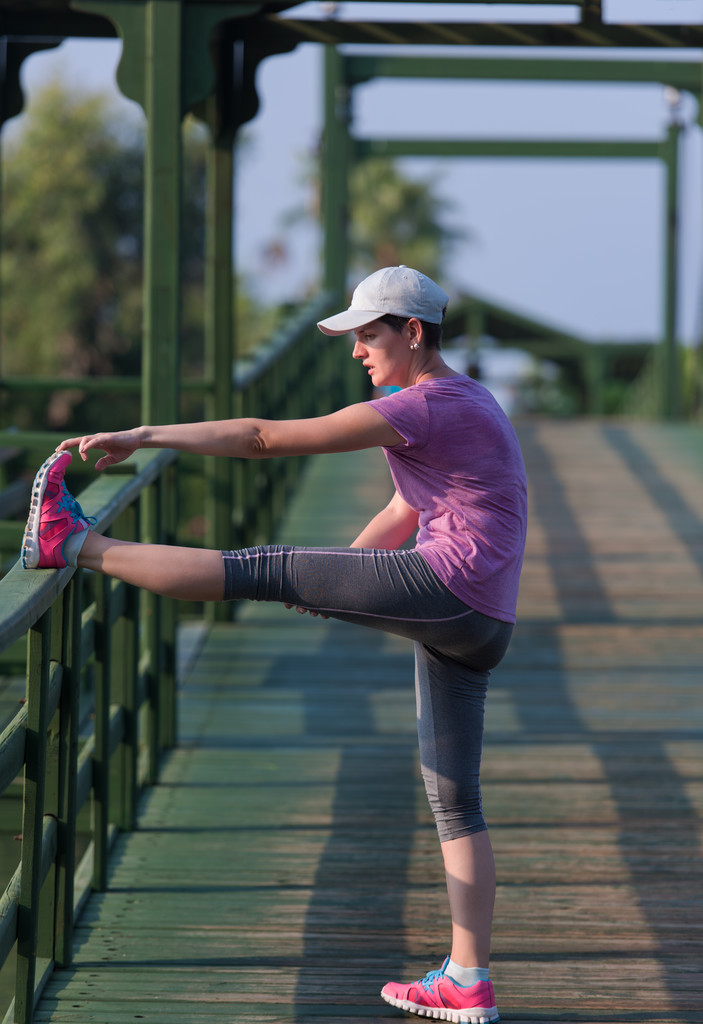 woman  stretching before morning jogging - Photo, Image
