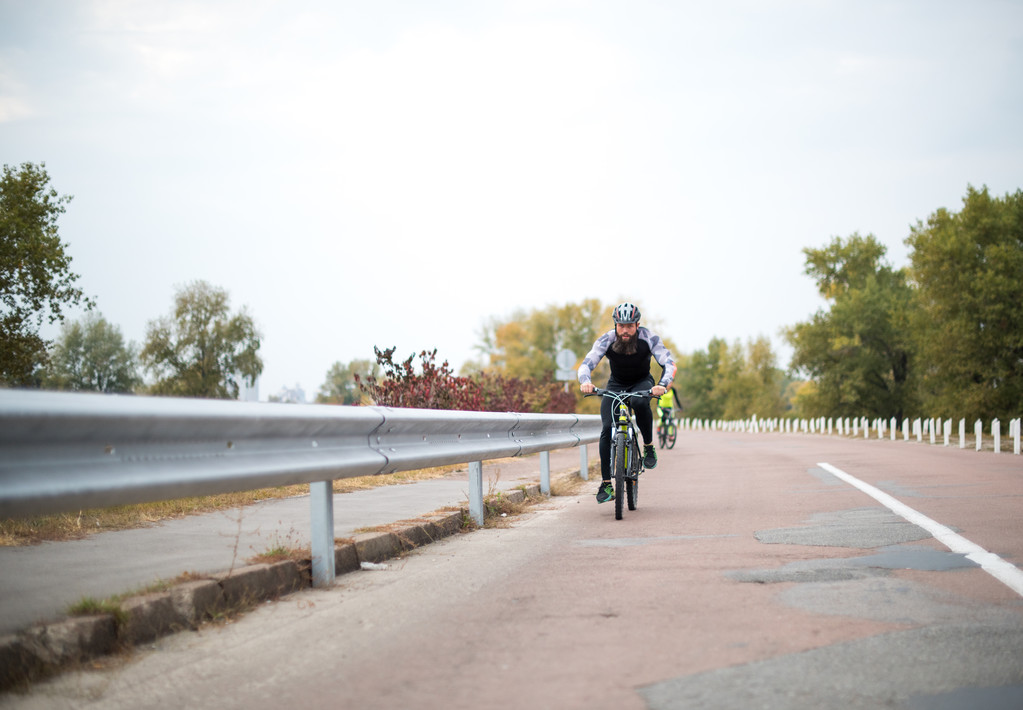 Man cycling on road  - Photo, Image