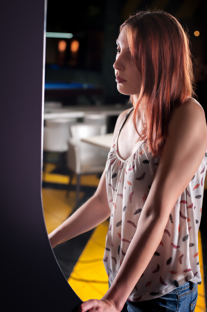 Young woman playing arcade - Photo, Image