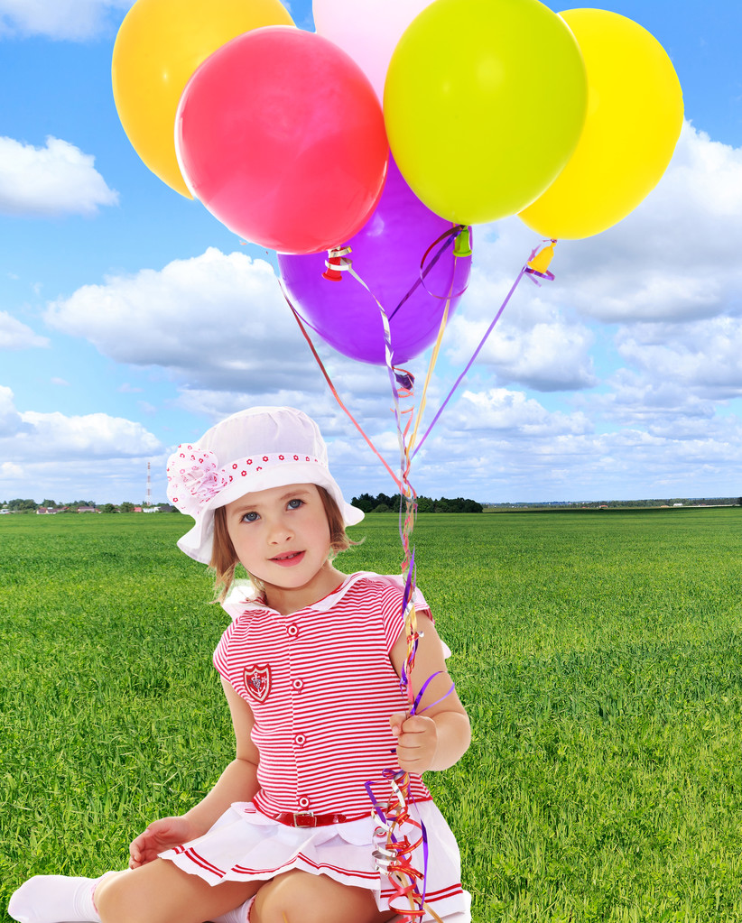 Girl holding balloons - Photo, Image
