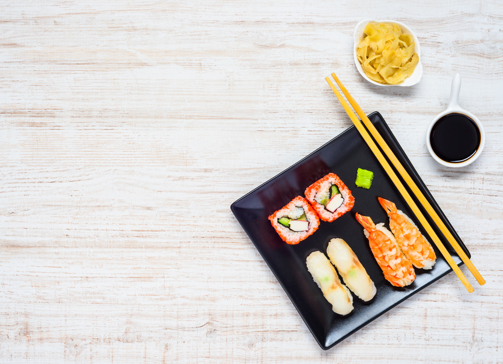 Sushi on Black Plate with Soy Sauce and Ginger on Copy Space - 写真・画像