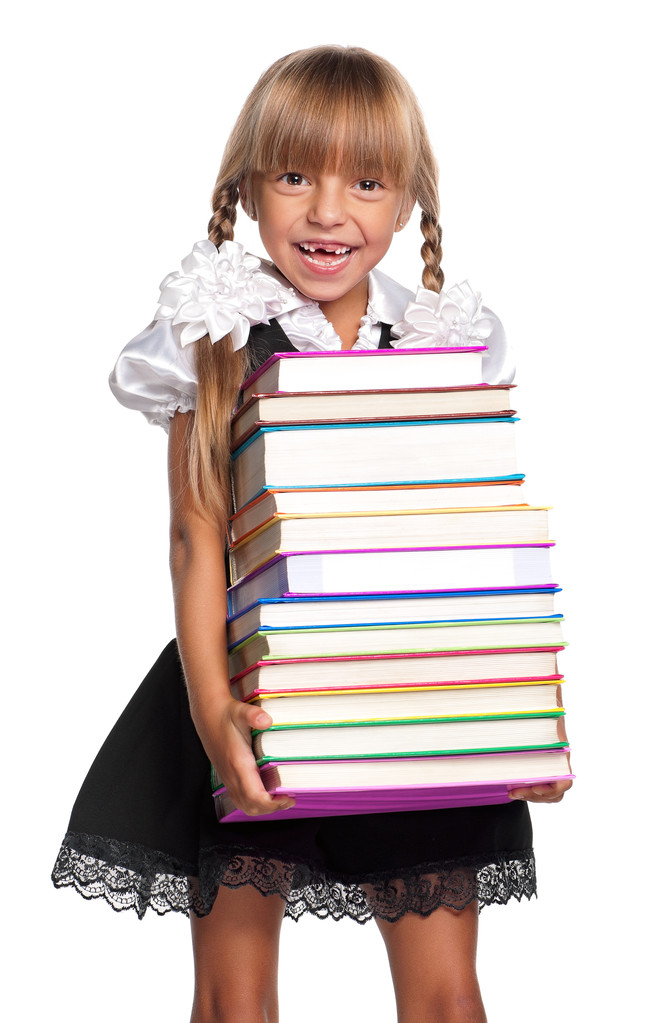 Маленькая девочка с книгами - Фото, изображение