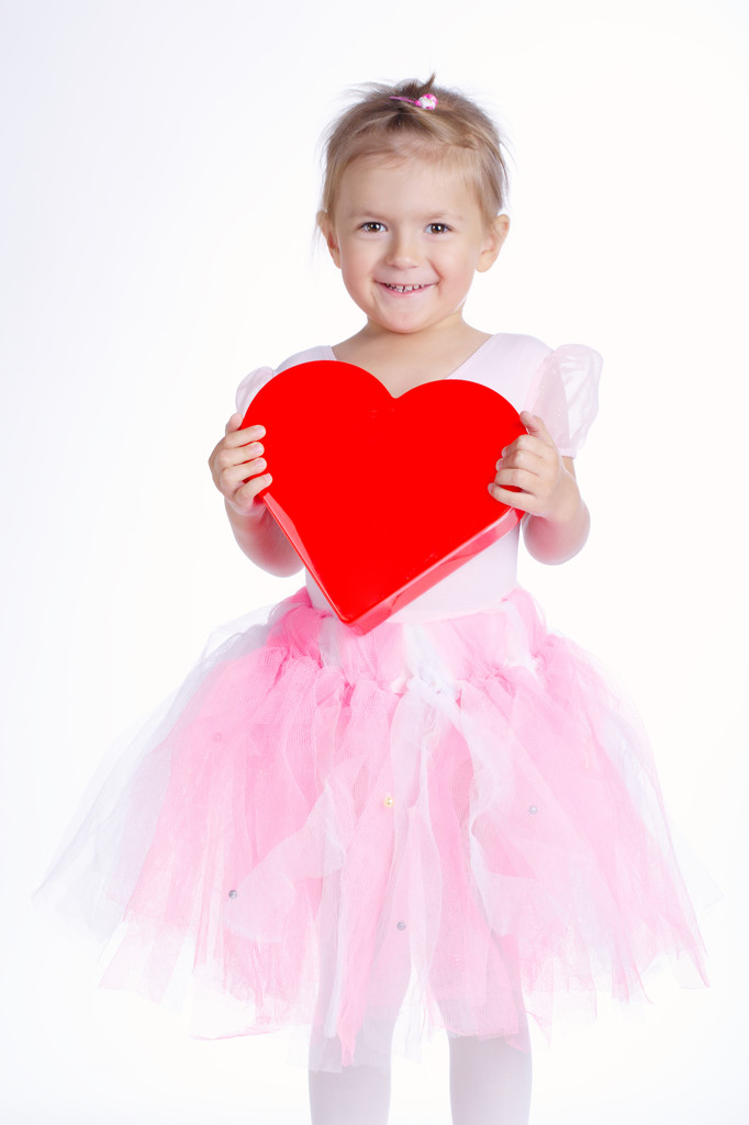 beautiful young girl with heart - Photo, Image
