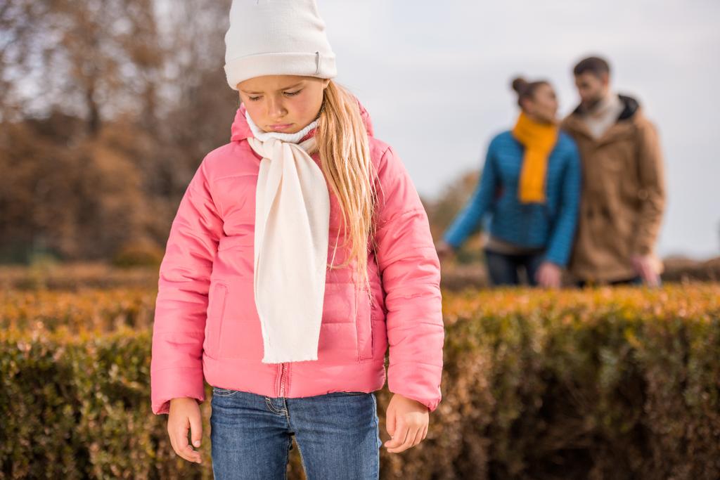 Sad little girl standing outdoors - Photo, Image