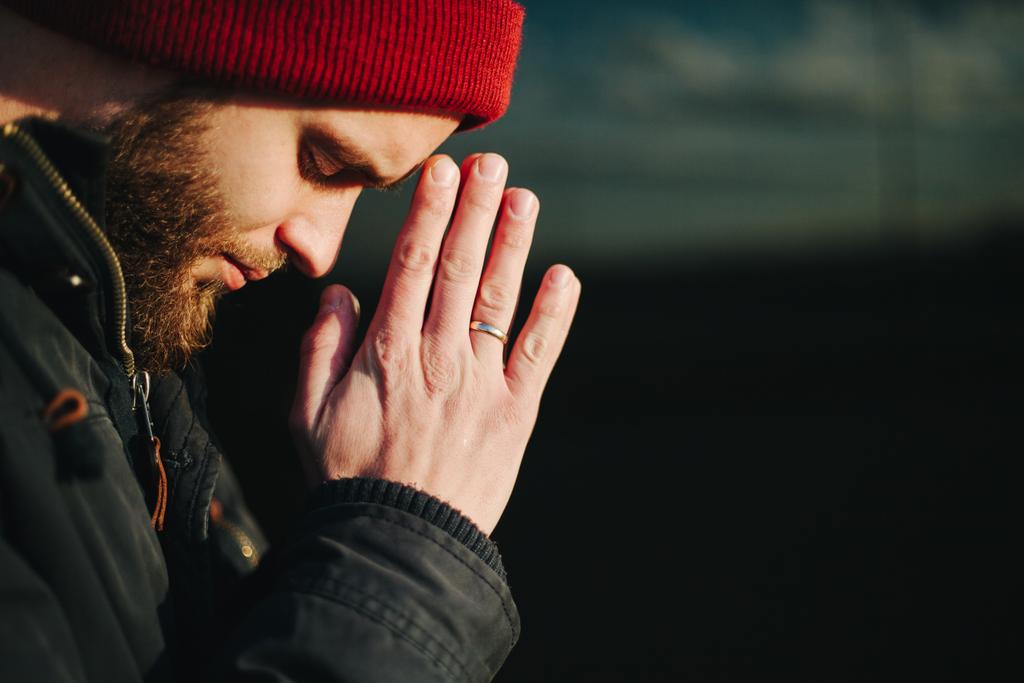 Man praying outside to God - Photo, Image