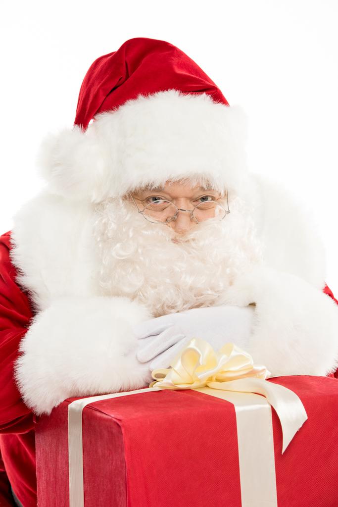 Santa Claus with pile of Christmas gifts - Photo, Image