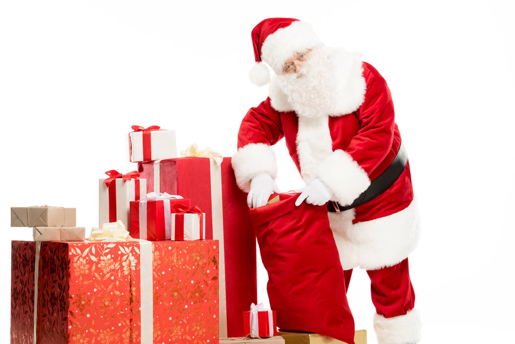 Санта-Клауса вивіз різдвяні подарунки з мішковини - Фото, зображення