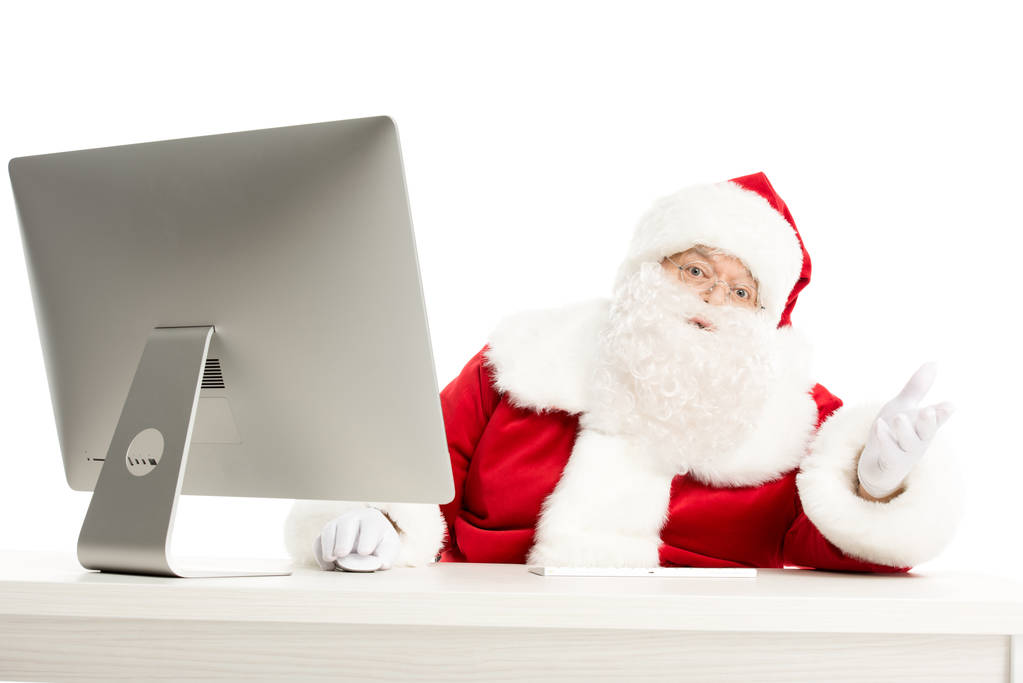 Papai Noel usando o computador
   - Foto, Imagem