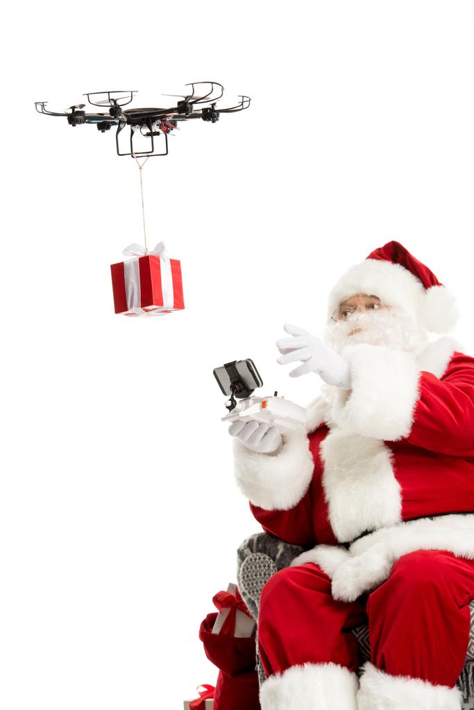 Santa Claus using drone  - Photo, Image