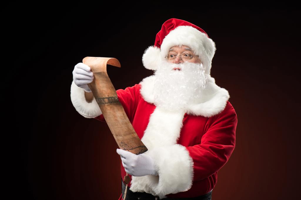 Santa Claus lezing verlanglijst - Foto, afbeelding